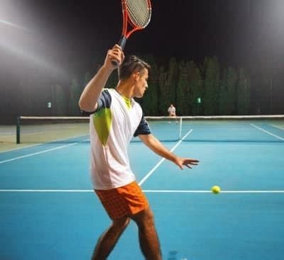 game of tennis at night